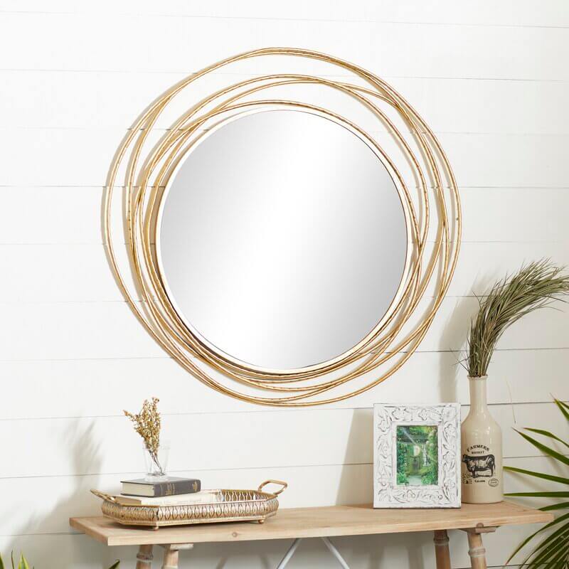 gold round mirror